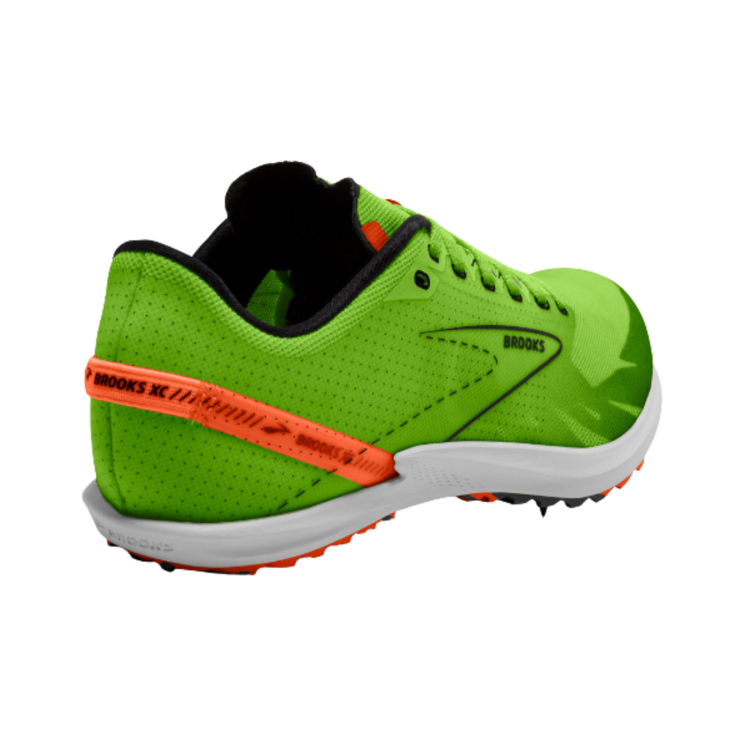 Back heel view of the Brooks Men’s Draft XC Spike in Green Gecko/Red Orange/White highlighting the supportive heel structure, lightweight upper construction, cushioned EVA midsole, and durable rear outsole design built for stability, comfort, and confident footing across uneven terrain.