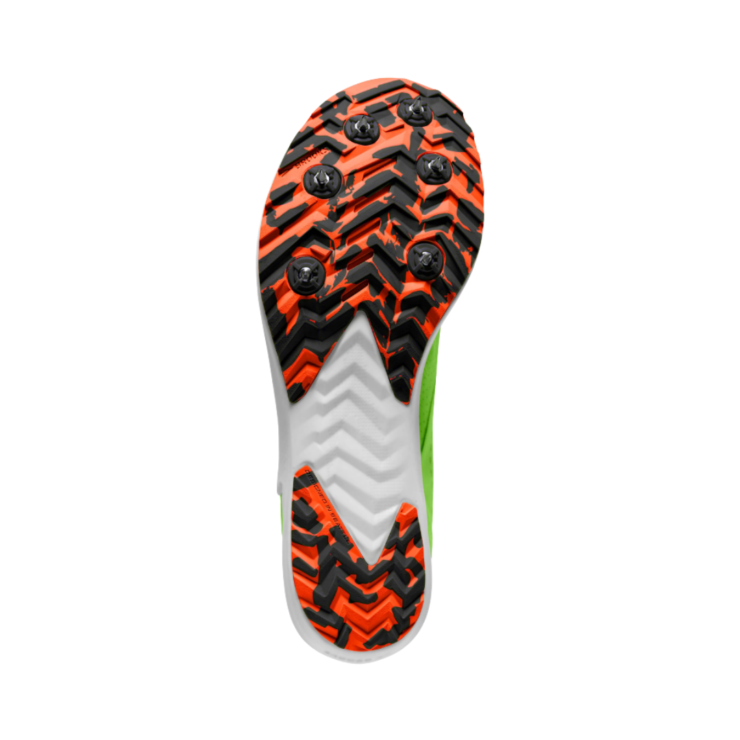 Bottom outsole view of the Brooks Men’s Draft XC Spike in Green Gecko/Red Orange/White featuring the aggressive spike plate with 6 removable spikes and durable rubber lug outsole designed to maximize traction, grip, and stability on dirt, grass, gravel, and varied cross-country terrain while supporting conditions such as shin splints, impact stress, neutral arches, forefoot pressure relief, and race-day foot fatigue.
