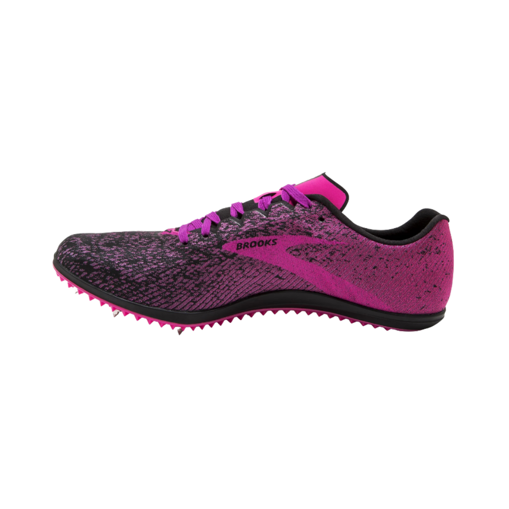 Brooks Women’s Mach 19 XC Spike in Black/Hollyhock/Pink featuring an ultra-light mesh upper, sleek cross-country racing silhouette, 3D Fit Print overlays, full-length Pebax® spike plate, EVA midsole cushioning, and durable rubber outsole designed for explosive speed, responsive performance, and confident traction across varied XC terrain.