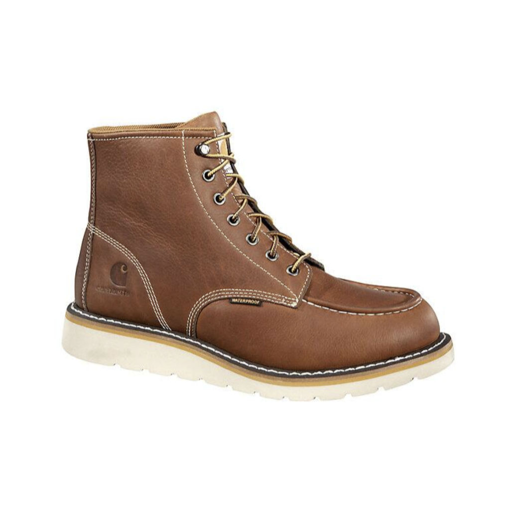 Carhartt Men's Waterproof 6" Wedge (Plain Toe) Boot in Soft Tan featuring an oil-tanned full-grain leather upper, Storm Defender® waterproof membrane, 6-inch work boot silhouette, PU Strobel pad, Cushion Comfort PU insole, steel shank for arch support, and dual-density slip-resistant wedge outsole designed for lasting comfort, stability, and dependable performance.