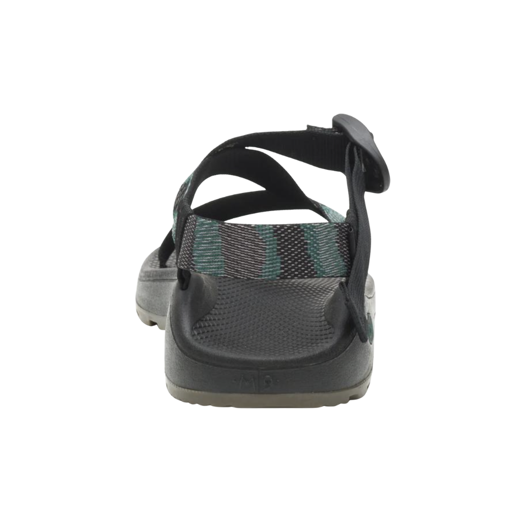 Back heel view of the Chaco Men’s ZCloud Sandal in Weave Black highlighting the adjustable heel strap, supportive LUVSEAT™ footbed, cushioned ZCloud™ midsole, and durable ChacoGrip™ outsole designed to enhance rearfoot stability, comfort, and confidence on uneven terrain.