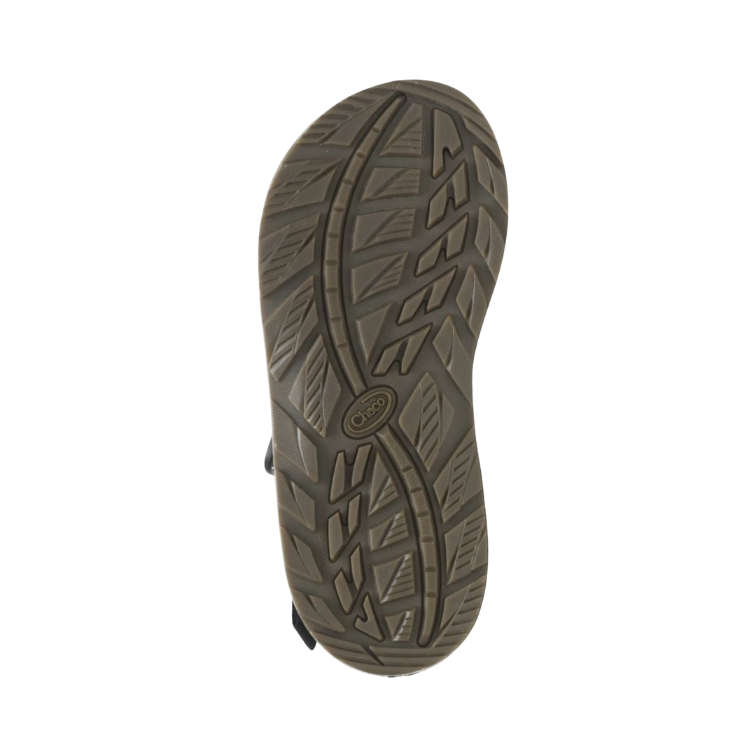 Bottom outsole view of the Chaco Men’s ZCloud Sandal in Weave Black featuring the ChacoGrip™ rubber outsole with aggressive traction pattern engineered to provide dependable grip and stability on wet, dry, and uneven surfaces while supporting conditions such as plantar fasciitis, flat feet, metatarsalgia, overpronation, and general foot fatigue.