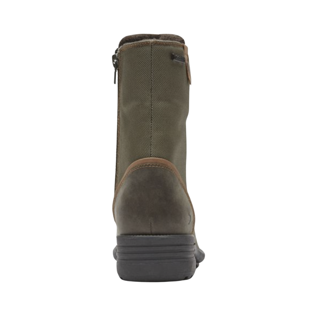 Back heel view of the Cobb Hill Women’s Brunswick Lace Waterproof Boot in Forest highlighting the supportive ankle structure, interior side zipper for easy on/off access, seam-sealed waterproof construction, textile lining, and durable heel design for enhanced stability and comfort.