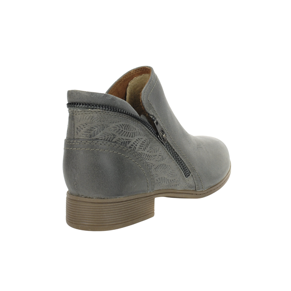 Back heel view of the Cobb Hill Women’s Crosbie Bootie in Dusty Olive highlighting the supportive heel counter, premium leather construction, breathable textile lining, cushioned EVA footbed, and lightweight TPR outsole designed to enhance stability, comfort, and durability throughout the day.