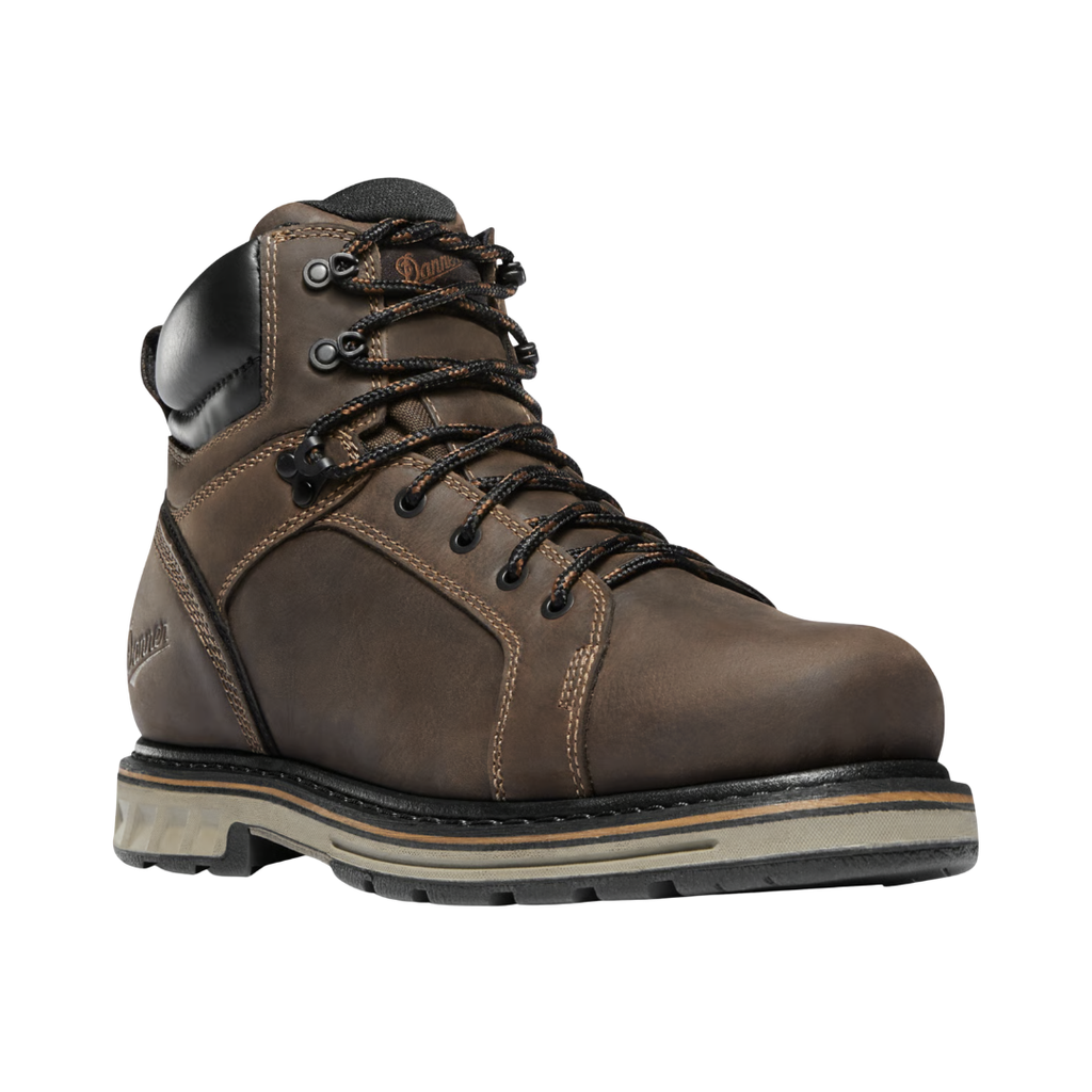 Danner Men’s Steel Yard 6" Waterproof Steel Toe Boot in Brown featuring a premium full-grain leather upper, 6-inch work boot silhouette, steel safety toe, Danner Dry waterproof protection, PLUS dual-density footbed, steel shank, Goodyear welt construction, and Danner Steel Yard outsole designed for exceptional durability, stability, and all-day comfort on demanding job sites.