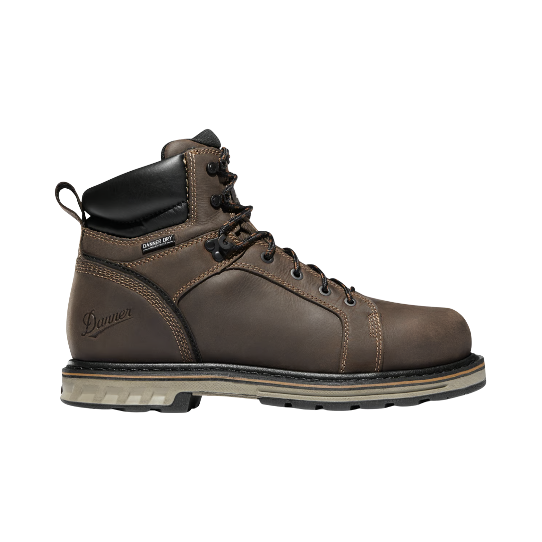 Danner Men’s Steel Yard 6" Waterproof Steel Toe Boot in Brown featuring a premium full-grain leather upper, 6-inch work boot silhouette, steel safety toe, Danner Dry waterproof protection, PLUS dual-density footbed, steel shank, Goodyear welt construction, and Danner Steel Yard outsole designed for exceptional durability, stability, and all-day comfort on demanding job sites.