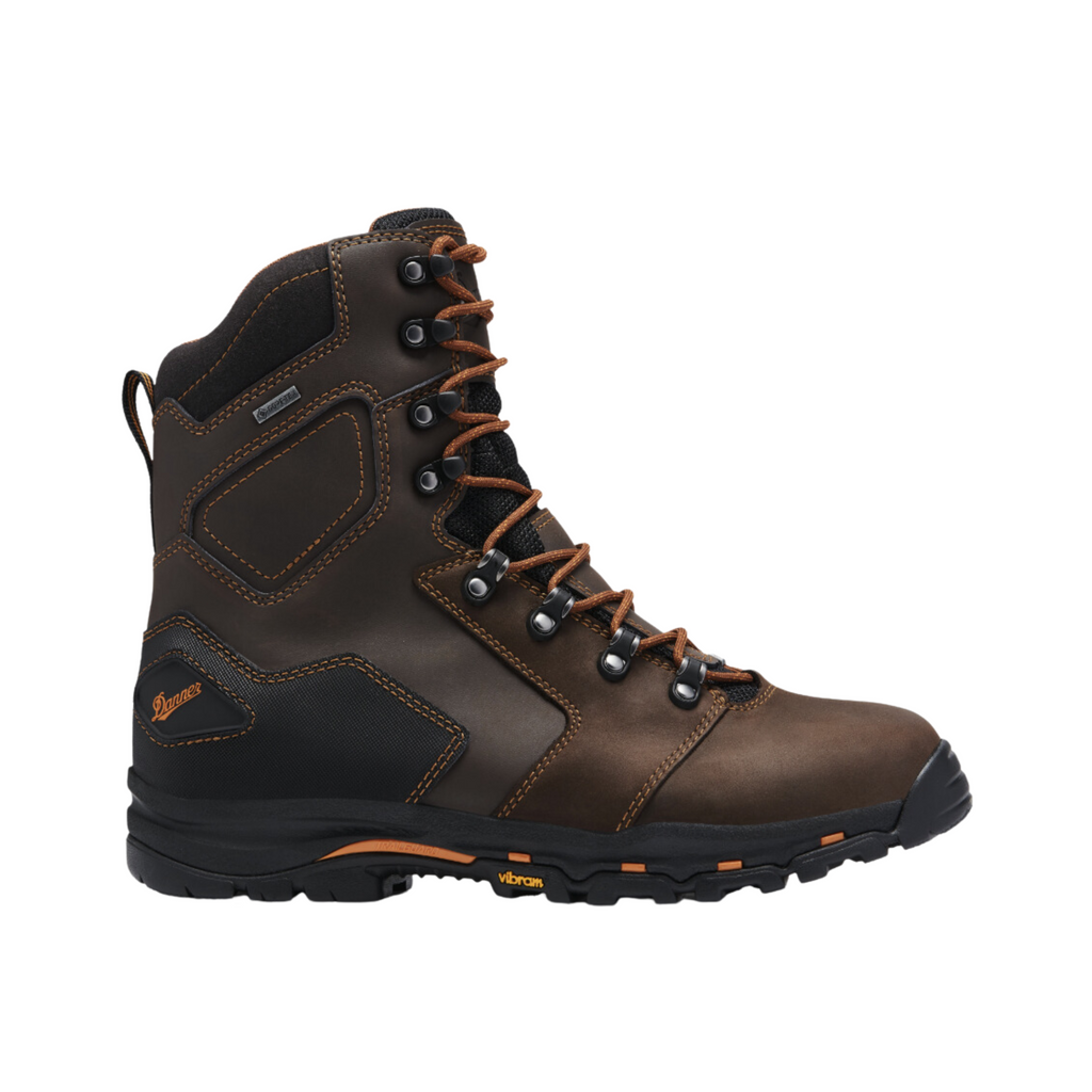 Danner Men’s Vicious 8" Composite Toe NMT Boot in Brown featuring a full-grain waterproof leather upper, 8-inch work boot silhouette, non-metallic composite safety toe, Danner Dry waterproof barrier, dual-density EVA midsole, TPU shank, Trailguard platform, Vibram Vicious outsole, and durable construction designed for protection, stability, and all-day comfort in demanding work environments.