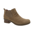 Dansko Women’s Bea Ankle Boot in Biscotti featuring a premium waterproof leather upper, ankle boot silhouette, leather stacked heel, removable molded EVA footbed with memory foam, Dansko Natural Arch® technology, crepe-textured TR rubber outsole, and timeless design built for supportive comfort and everyday versatility.