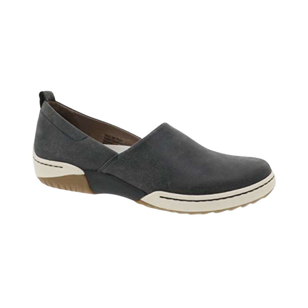 Dansko Women’s Reba Vintage Slip-On Shoe in Black featuring a soft leather upper, streamlined slip-on silhouette, Dansko Natural Arch™ technology, lightweight EVA midsole, durable outsole, and refined everyday design built for lasting comfort, stability, and effortless wear.