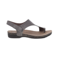 Dansko Women’s Reece Sandal in Stone Waxy featuring a genuine leather upper, minimalist open-toe silhouette, adjustable hook-and-loop strap, Dansko Natural Arch® technology, molded EVA footbed, lightweight rubber outsole, and supportive design built for lasting comfort and everyday wear.