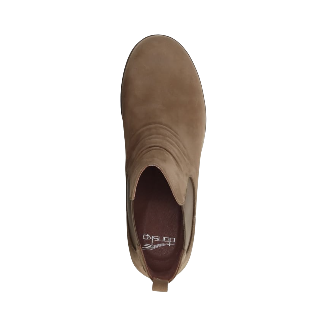 Top view of the Dansko Women’s Bea Ankle Boot in Biscotti displaying the waterproof leather upper, leather and textile linings, removable molded EVA footbed with memory foam, Dansko Natural Arch® technology, and orthotic-friendly design engineered to provide breathable comfort, cushioning, and lasting support.