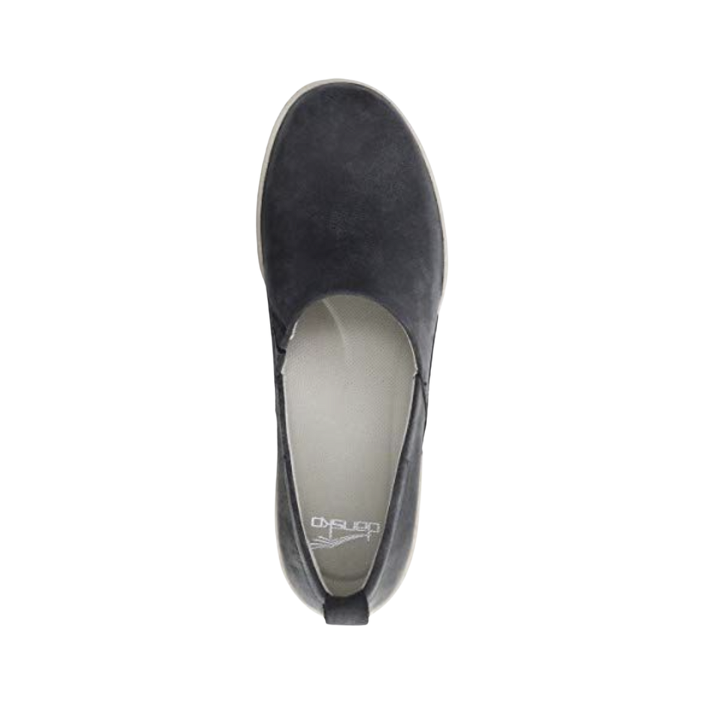 Top view of the Dansko Women’s Reba Vintage Slip-On Shoe in Black displaying the premium leather upper, slip-on opening, Aegis® odor-control treated textile lining, Dri-Lex® moisture-wicking socklining, supportive EVA footbed, and ergonomic design engineered to keep feet cool, dry, and comfortable during extended wear.