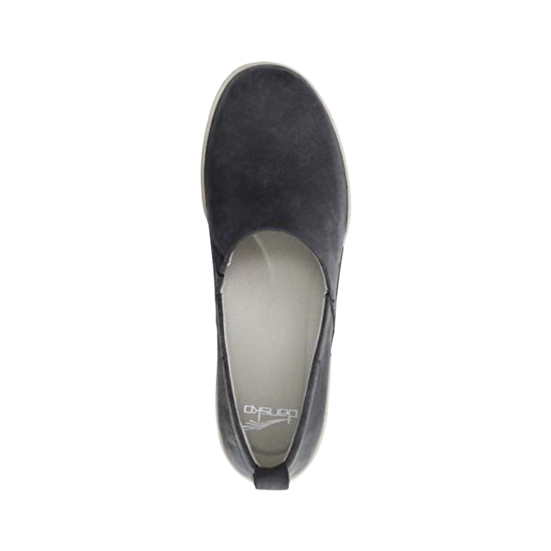 Top view of the Dansko Women’s Reba Vintage Slip-On Shoe in Black displaying the premium leather upper, slip-on opening, Aegis® odor-control treated textile lining, Dri-Lex® moisture-wicking socklining, supportive EVA footbed, and ergonomic design engineered to keep feet cool, dry, and comfortable during extended wear.