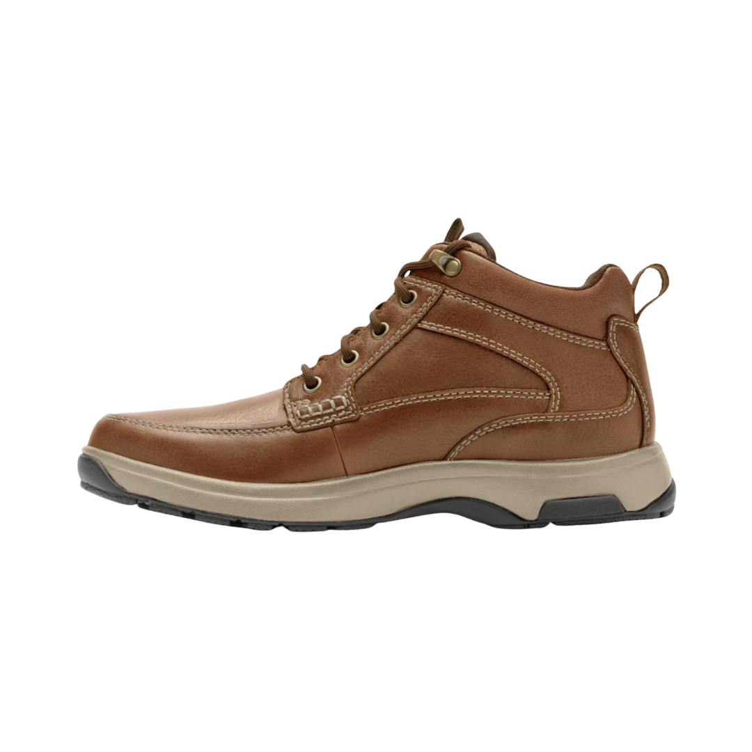 Dunham Men’s 8000 Waterproof Mid Boot in Tan featuring a waterproof leather and textile upper, mid-height hiking boot silhouette, seam-sealed construction, Stability R-Bar® with nylon shank, lightweight EVA midsole, removable memory foam and EVA footbed, and rugged rubber outsole built for lasting comfort, support, and all-terrain performance.