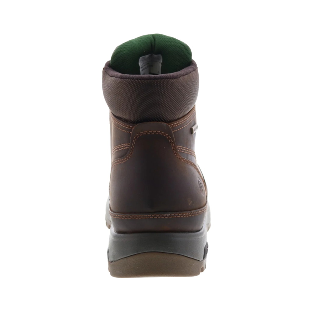 Back heel view of the Dunham Men’s 8000 Works Moc Plain Toe Boot in Brown highlighting the supportive heel and collar, RBar Stability System, nylon shank, padded ankle area, and durable rubber outsole designed to improve rearfoot stability, reduce fatigue, and provide dependable support throughout demanding workdays.