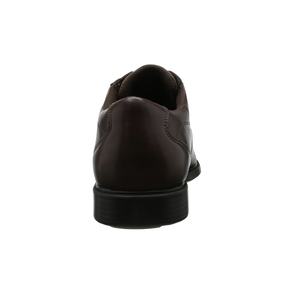 Back heel view of the Dunham Men’s Douglas Bike Front Oxford in Brown highlighting the supportive heel construction, cushioned collar, Stability R-Bar® technology, nylon shank, shock-absorbing EVA midsole, and durable rubber outsole designed to improve stability and reduce foot fatigue throughout the day.