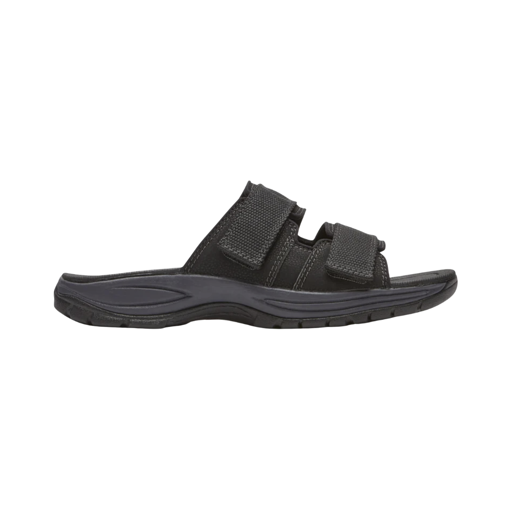 Dunham Men’s Newport Waterproof Slide in Black featuring a waterproof full-grain leather upper, easy slip-on design, lightweight EVA midsole, nylon shank for stability, and slip-resistant rubber outsole designed for convenient all-weather comfort and dependable support.