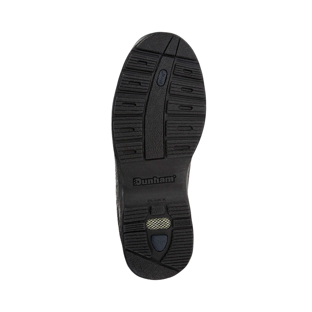 Bottom outsole view of the Dunham Men’s Windsor Oxford in Dark Brown featuring the slip-resistant rubber outsole engineered to provide dependable traction across a variety of surfaces while the R-Bar® Stability Technology, nylon shank, EVA midsole, and cushioned footbed help provide comfort for conditions such as plantar fasciitis, heel pain, flat feet, overpronation, bunions, arthritis, joint pain, metatarsalgia, diabetic-sensitive feet, and general foot fatigue.