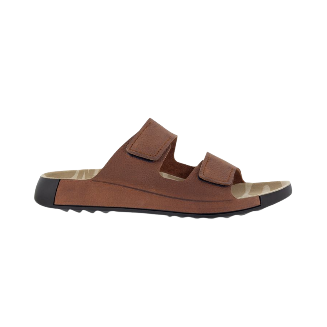 ECCO Men’s 2nd Cozmo Slide Sandal in Tuscany featuring a premium full-grain leather upper, easy slide-on design, contoured anatomical footbed, FLUIDFORM™ Direct Comfort Technology, soft PU midsole and outsole, and streamlined Scandinavian styling designed for lightweight cushioning and everyday comfort.