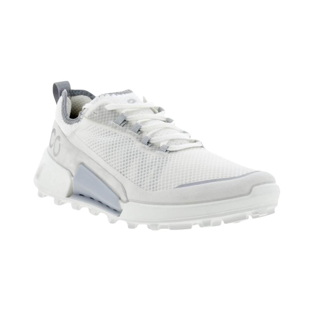 ECCO Women’s BIOM 2.1 X Country Low in Shadow White featuring a lightweight mesh and synthetic upper, BIOM® Natural Motion® Technology, soft textile lining, OrthoLite® removable insole, reinforced toe guard, and flexible rubber outsole with aggressive lugs designed for natural movement, stability, and trail-ready traction.