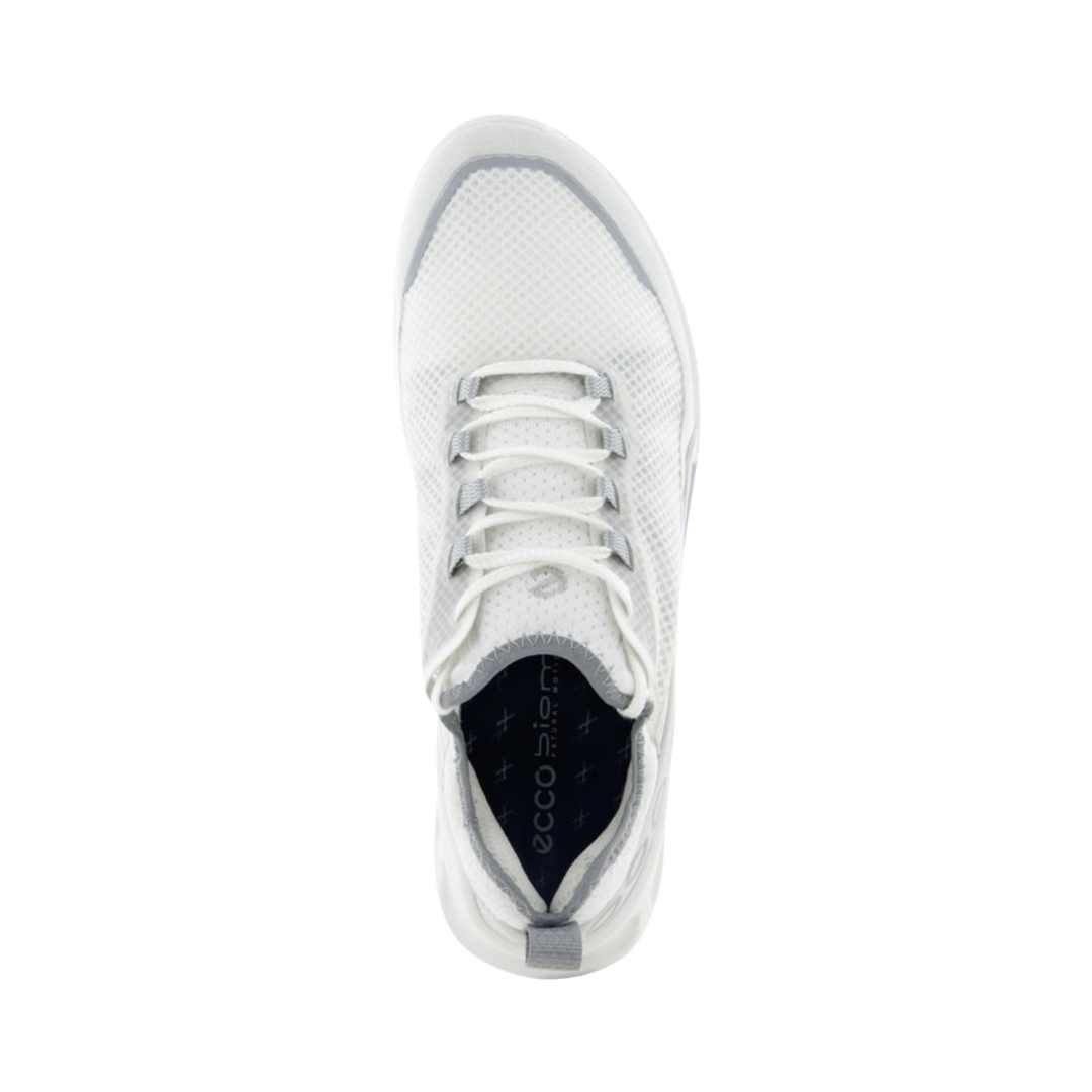 Top view of the ECCO Women’s BIOM 2.1 X Country Low in Shadow White displaying the lightweight mesh and synthetic upper, secure lace-up system, breathable textile lining, removable OrthoLite® insole, and supportive low-profile construction designed to promote natural foot movement and comfortable all-day wear.
