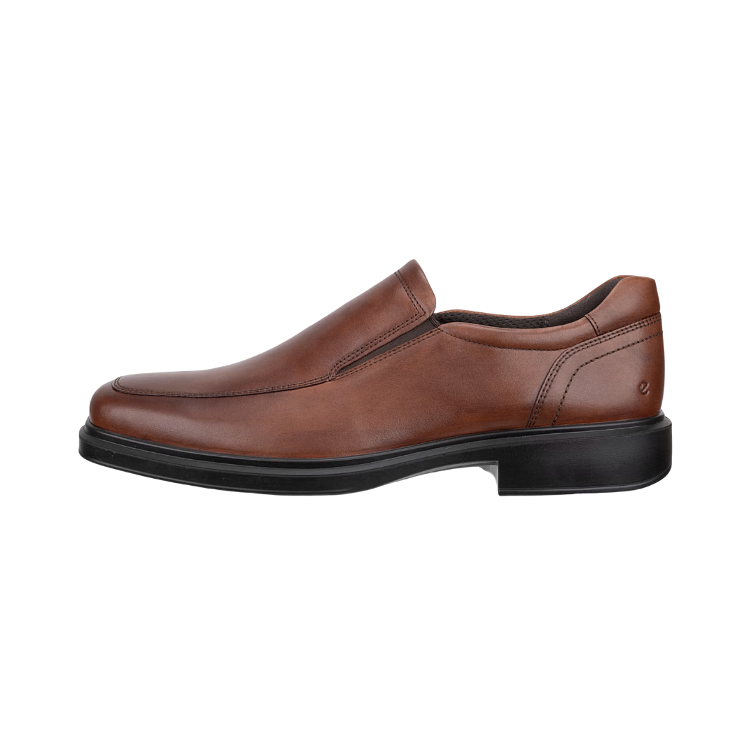 ECCO Men’s Helsinki 2 Apron Toe Slip-On in Cognac featuring a premium ECCO leather upper, classic apron toe design, easy slip-on construction, PHORENE™ molded footbed, removable Dual Fit insoles, FLUIDFORM™ shock-absorbing sole, and polished styling designed for comfortable professional and everyday wear.