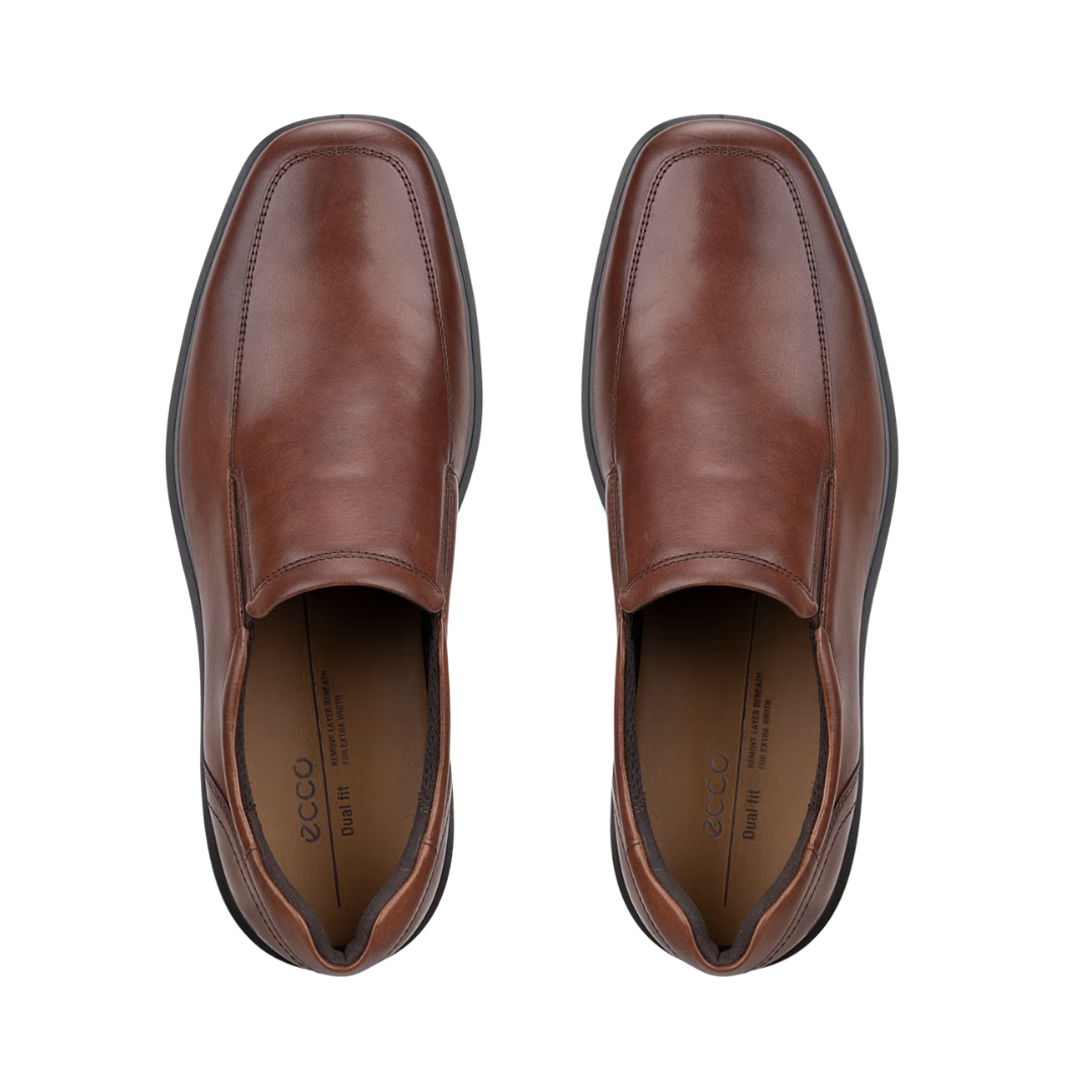 Top view of the ECCO Men’s Helsinki 2 Apron Toe Slip-On in Cognac displaying the premium leather upper, apron toe detailing, easy slip-on opening, perforated leather insole, and removable Dual Fit insoles designed to provide breathable comfort, customizable forefoot space, and accommodation for custom orthotics.