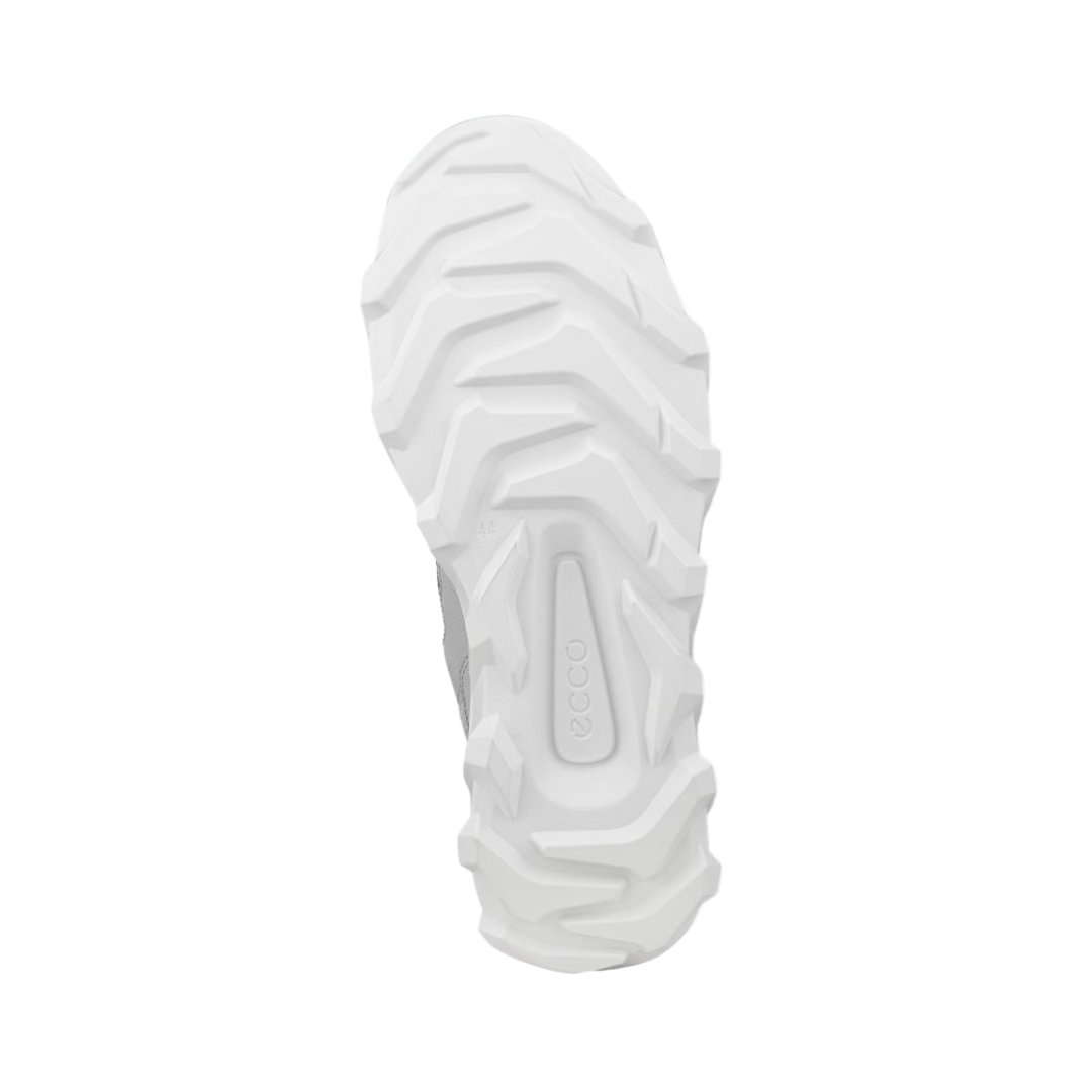 Bottom outsole view of the ECCO MX Low Breathru in Concrete/Silver Grey featuring the motocross-inspired rubber outsole with deep, aggressive lugs designed to provide durable grip and stability across varied surfaces while FLUIDFORM™ Direct Comfort Technology and cushioned support help provide comfort for conditions such as plantar fasciitis, flat feet, overpronation, metatarsalgia, arthritis, joint pain, and general foot fatigue.