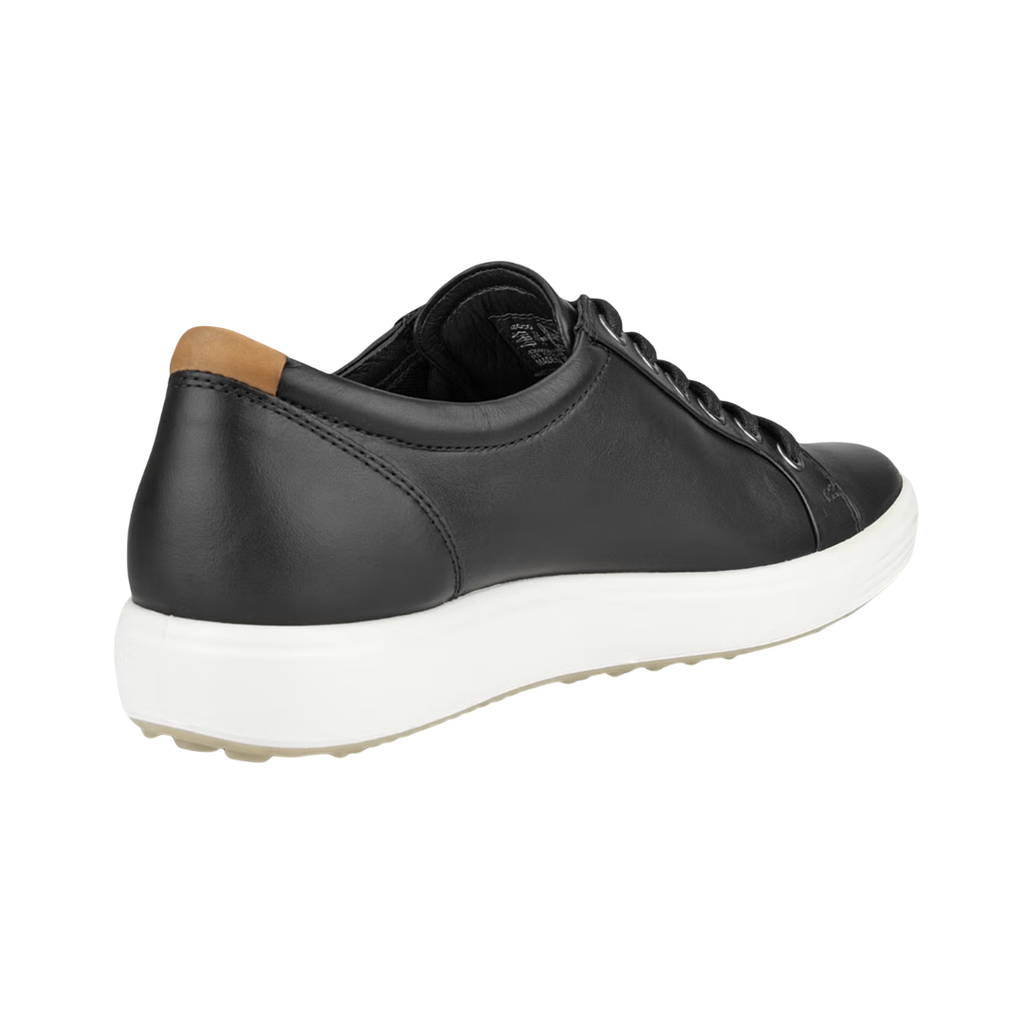 Back heel view of the ECCO Women’s Soft 7 Sneaker in Black highlighting the supportive heel construction, soft textile lining, cushioned FLUIDFORM™ sole, and durable PU/TPU outsole designed to provide stability, flexibility, and shock absorption throughout the day.