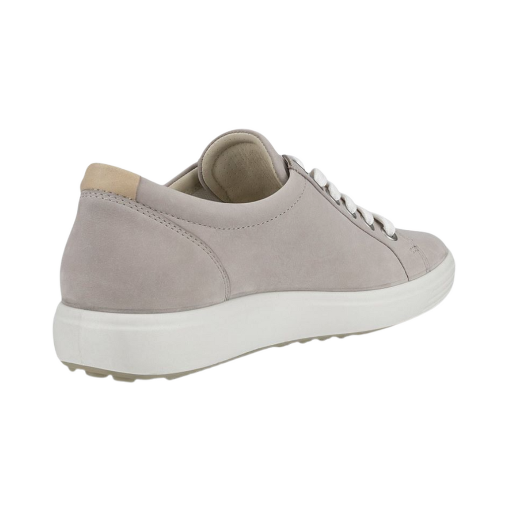 Back heel view of the ECCO Women’s Soft 7 Sneaker in Grey Rose highlighting the supportive heel construction, soft textile lining, cushioned FLUIDFORM™ sole, and durable PU/TPU outsole designed to provide stability, flexibility, and shock absorption throughout the day.