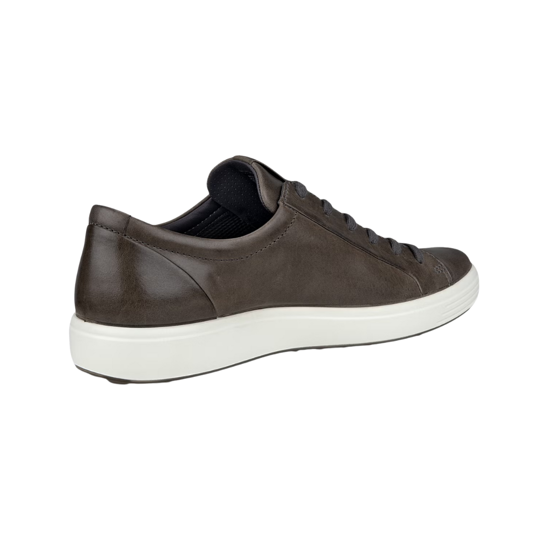 Back heel view of the ECCO Soft 7 City Sneaker in Titanium highlighting the supportive heel construction, breathable textile lining, cushioned FLUIDFORM™ sole, and durable PU/TPU outsole designed to provide stability, flexibility, and shock absorption during all-day wear.