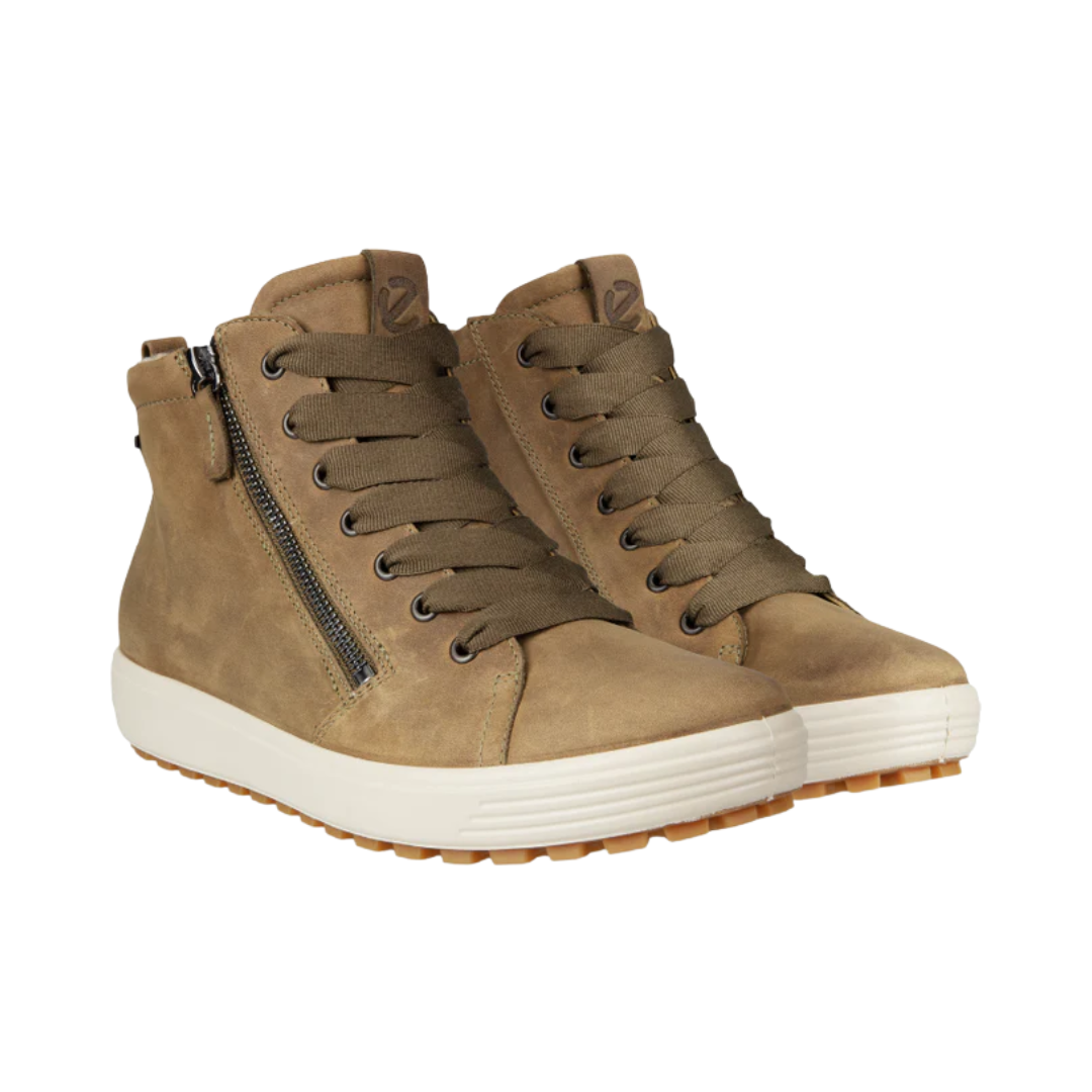 ECCO Women’s Soft 7 Tred GTX High in Sage featuring a premium nubuck leather upper, GORE-TEX® waterproof technology, warm textile lining, FLUIDFORM™ Direct Comfort Technology, high-top silhouette, removable leather-covered insole, and rugged rubber outsole designed for comfortable cold-weather performance.