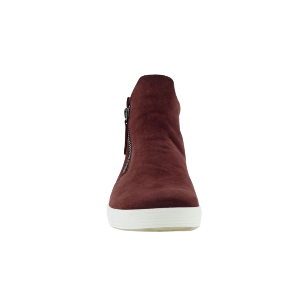 Front view of the ECCO Women’s Soft 7 Zip Bootie in Andorra showcasing the rich burgundy nubuck upper, sleek ankle-height silhouette, and clean Scandinavian-inspired styling designed to pair effortlessly with casual or polished outfits.