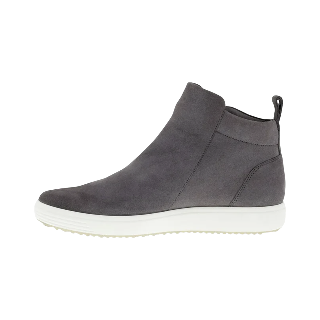 ECCO Women’s Soft 7 Zip Bootie in Gravity featuring a rich dark grey nubuck upper, convenient side zippers, FLUIDFORM™ Direct Comfort Technology, anatomically designed last, removable leather-covered insole, and durable PU/TPU outsole for lightweight, supportive everyday comfort.