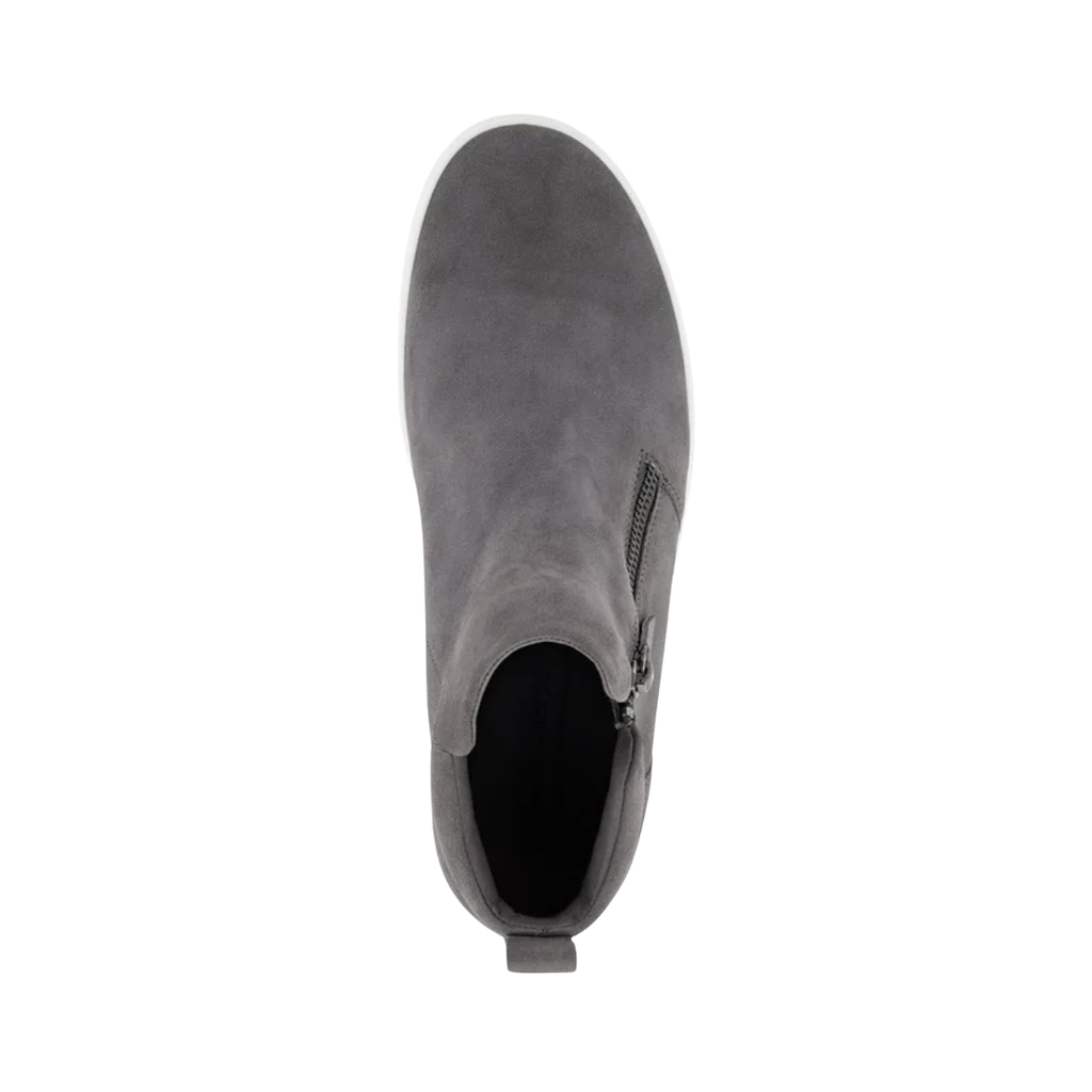 Top view of the ECCO Women’s Soft 7 Zip Bootie in Gravity displaying the premium nubuck upper, low bootie profile, side zipper closures, and removable leather-covered insole designed for easy on/off and a comfortable fit while accommodating custom orthotics or supportive inserts.