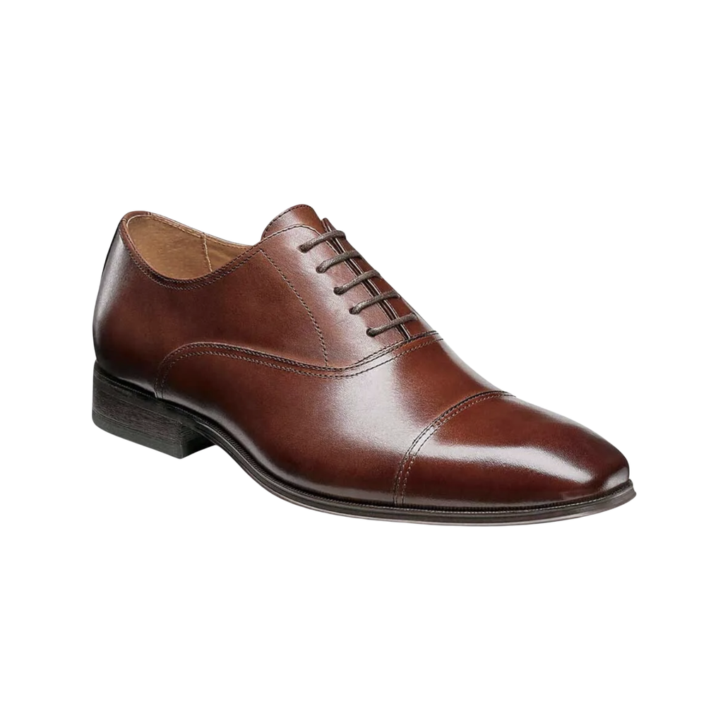 Florsheim Corbetta Cap-Toe Oxford in Cognac featuring a full-grain leather upper, classic cap-toe styling, cushioned Comfortech footbed, breathable leather and textile linings, and a flexible rubber outsole for polished everyday comfort.