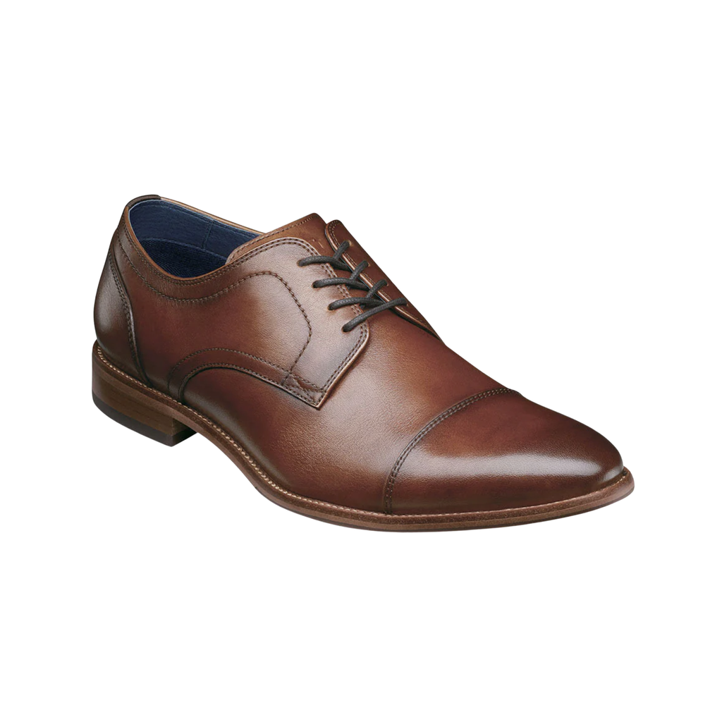 Florsheim Flex Cap-Toe Oxford in Cognac featuring a smooth full-grain leather upper, classic cap-toe detailing, cushioned Ortholite® insole, flexible rubber outsole, and traditional lace-up construction for polished comfort.