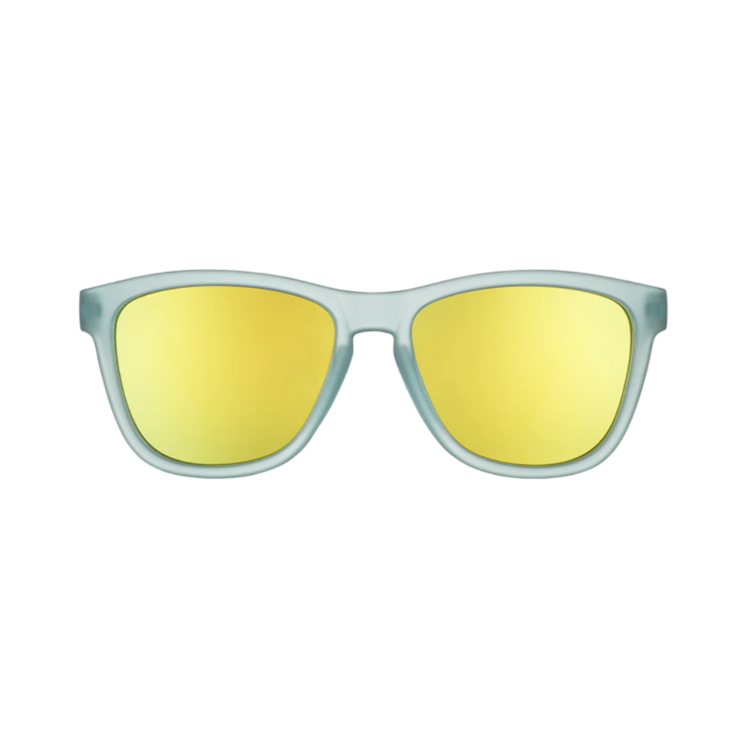 Front view of the Goodr OG "Sunbathing with Wizards" sunglasses showcasing the classic rounded silhouette, frosty blue frame, and reflective gold polarized lenses with UV400 protection.