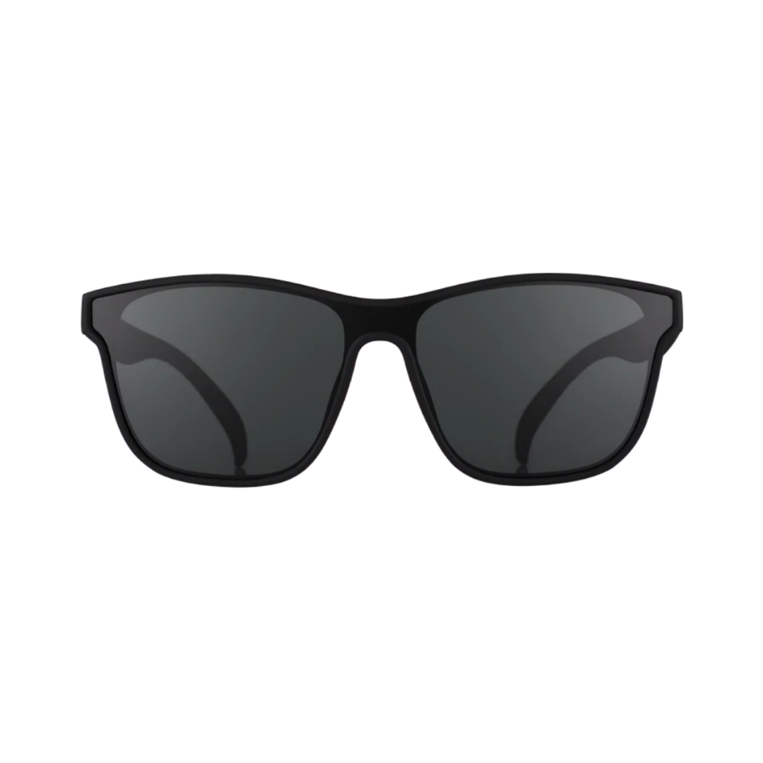 Front view of the Goodr VRG "The Future is Void" sunglasses showcasing the streamlined wraparound silhouette, all-black matte frame, and polarized UV400 lenses designed to reduce glare and provide full UVA and UVB protection.