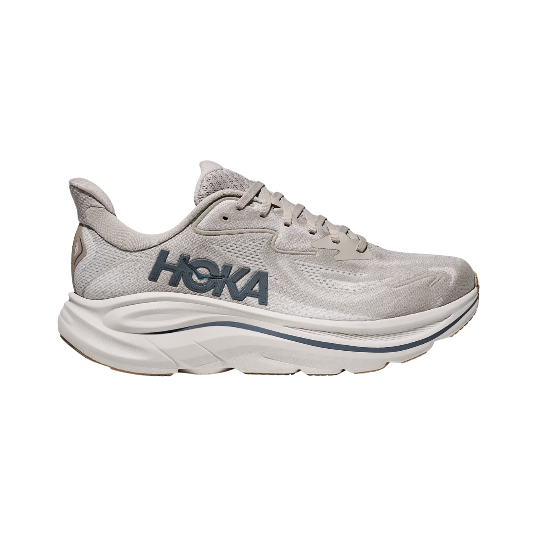 Side view of the HOKA Men’s Clifton 10 in Putty/Grout, showcasing the lightweight jacquard knit upper, plush CMEVA midsole cushioning, and smooth MetaRocker™ geometry for a soft, efficient ride.