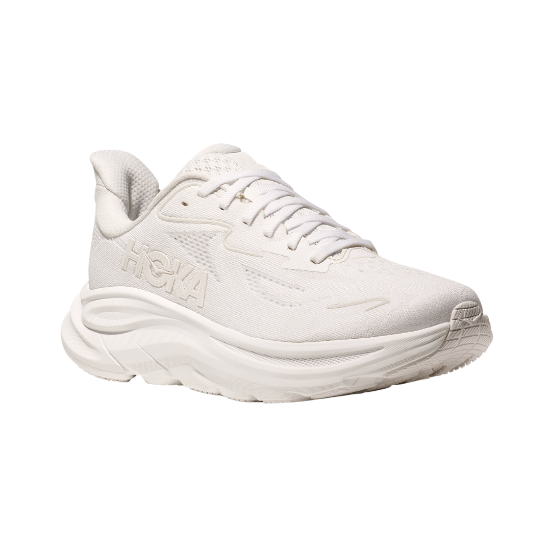 Side view of the HOKA Women’s Clifton 10 in White/White, showcasing the lightweight jacquard knit upper, plush CMEVA midsole cushioning, and smooth MetaRocker™ geometry for a soft, efficient ride.
