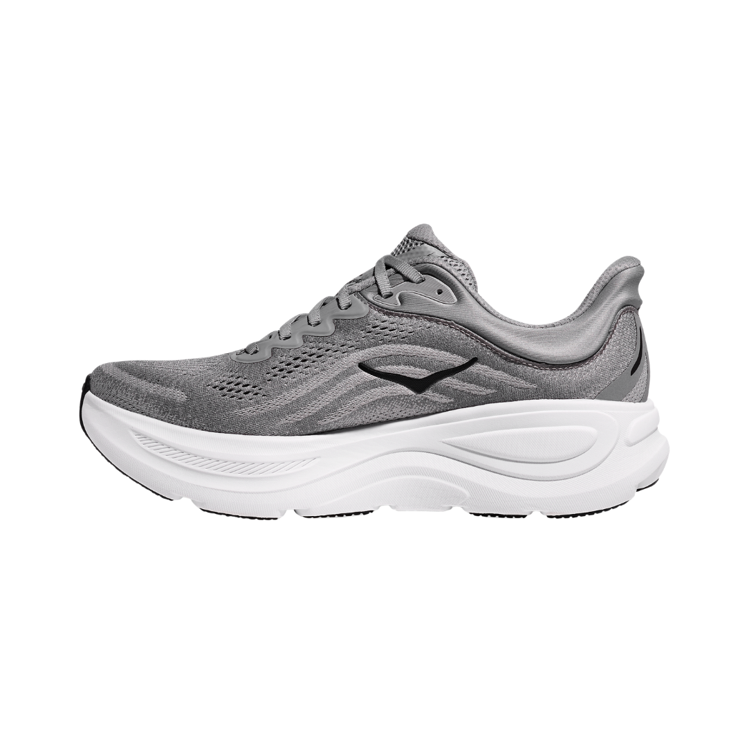 Side view of the HOKA Men’s Bondi 9 in Galactic Grey/Stellar Grey, showcasing the thick super critically foamed EVA midsole, smooth MetaRocker™ profile, and breathable recycled polyester upper for maximum cushioned support.