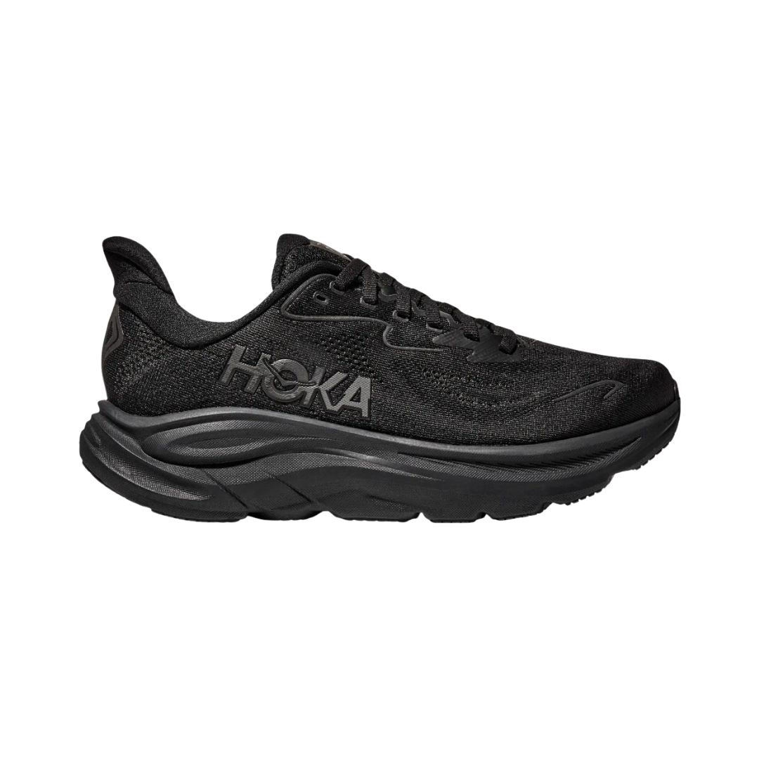 Side view of the HOKA Men’s Clifton 10 in Black/Black, showcasing the lightweight jacquard knit upper, plush CMEVA midsole cushioning, and smooth MetaRocker™ geometry for a soft, efficient ride.