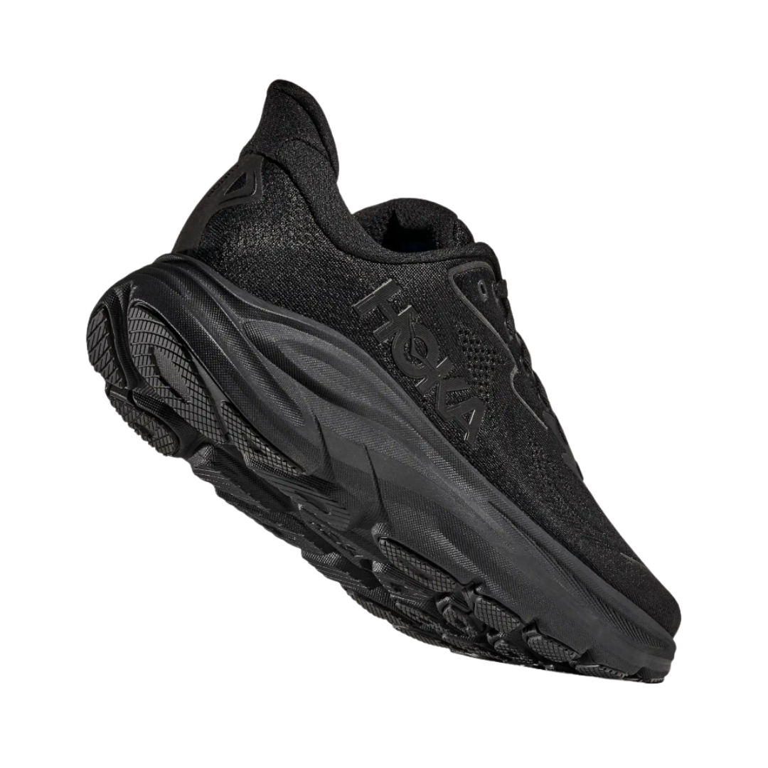 Bottom heel view of the HOKA Men’s Clifton 10 in Black/Black, highlighting the durable outsole with traction zones designed for reliable grip and long-lasting performance.
