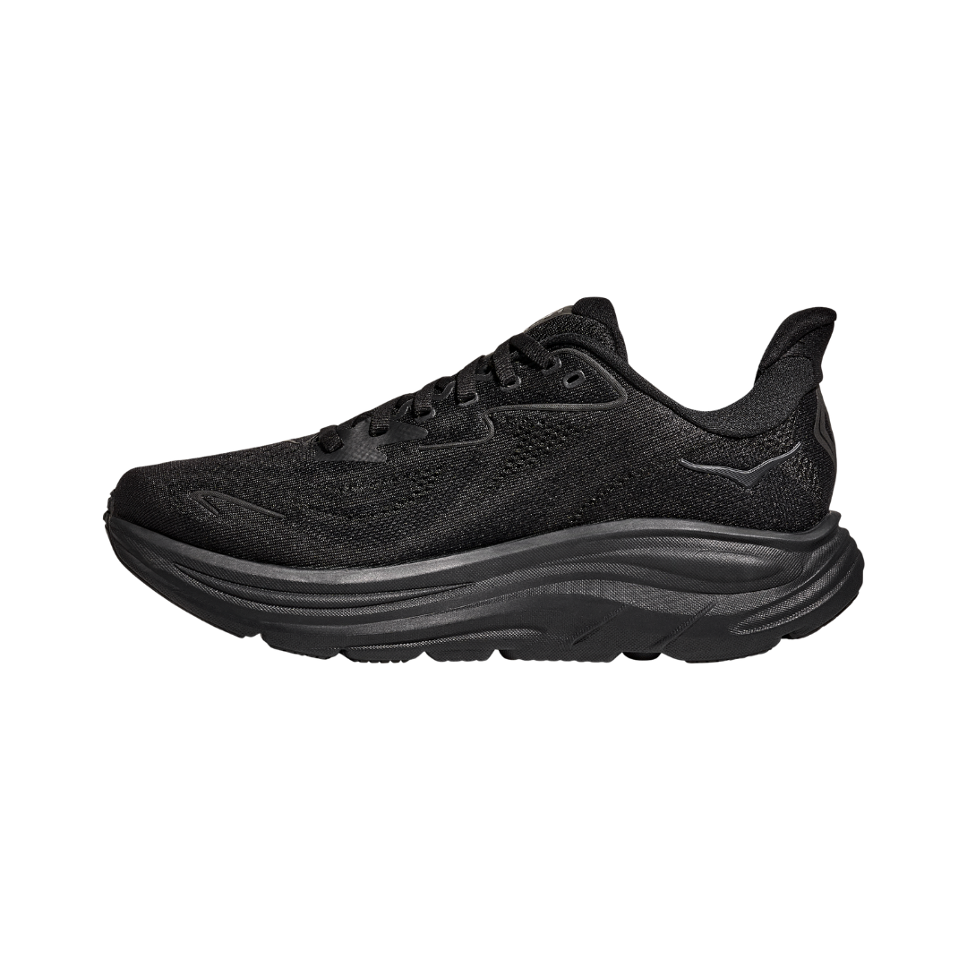 Side view of the HOKA Men’s Clifton 10 in Black/Black, showcasing the lightweight jacquard knit upper, plush CMEVA midsole cushioning, and smooth MetaRocker™ geometry for a soft, efficient ride.