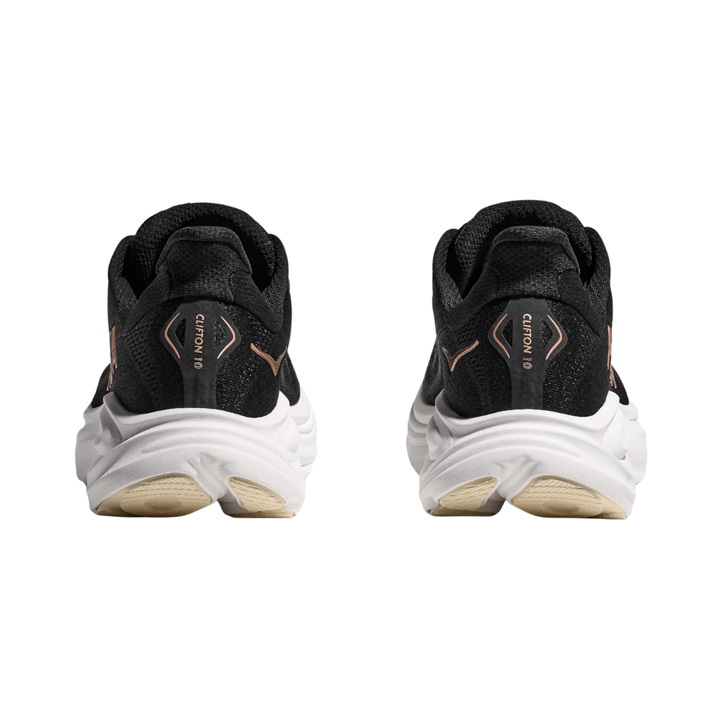 Heel view of the HOKA Women’s Clifton 10 in Black/Rose Gold, highlighting the rearfoot-focused Active Foot Frame™ and padded heel collar for stable landings and secure support.