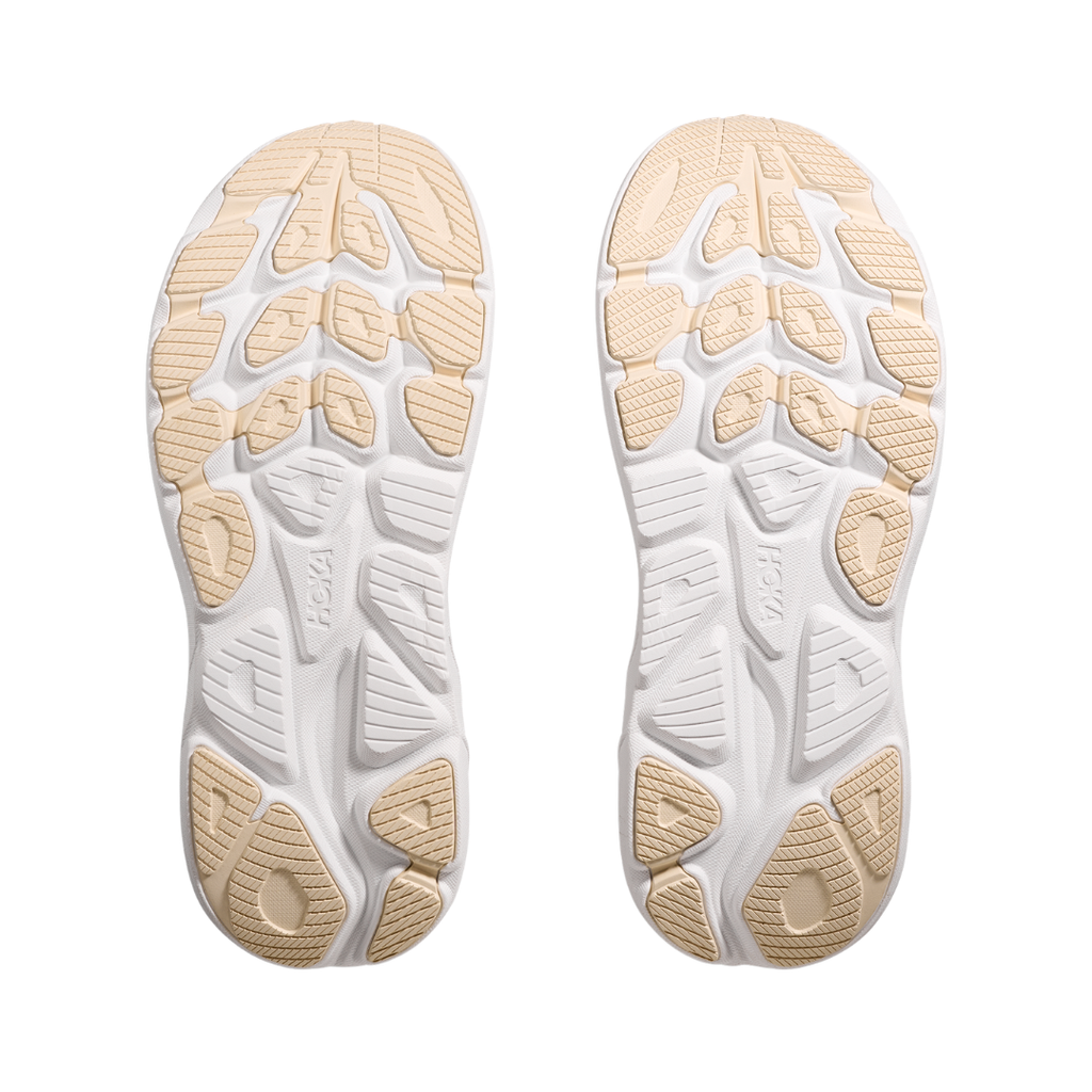 Bottom view of the HOKA Women’s Clifton 10 in Black/Rose Gold, highlighting the durable outsole with traction zones designed for reliable grip and long-lasting performance.