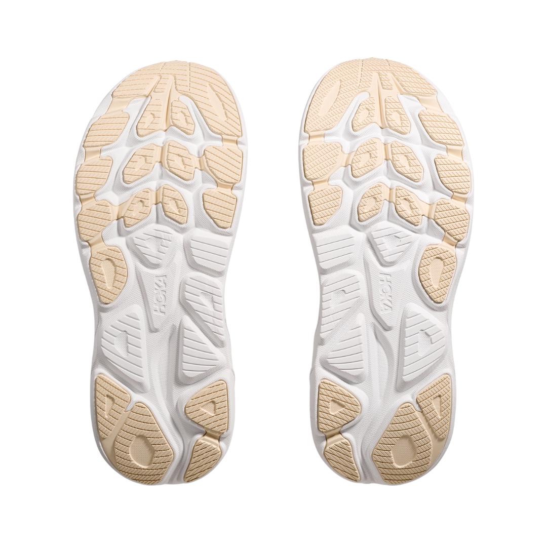 Bottom view of the HOKA Women’s Clifton 10 in Black/Rose Gold, highlighting the durable outsole with traction zones designed for reliable grip and long-lasting performance.