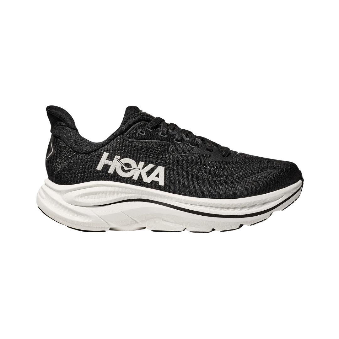 Side view of the HOKA Women’s Clifton 10 in Black/White, showcasing the lightweight jacquard knit upper, plush CMEVA midsole cushioning, and smooth MetaRocker™ geometry for a soft, efficient ride.