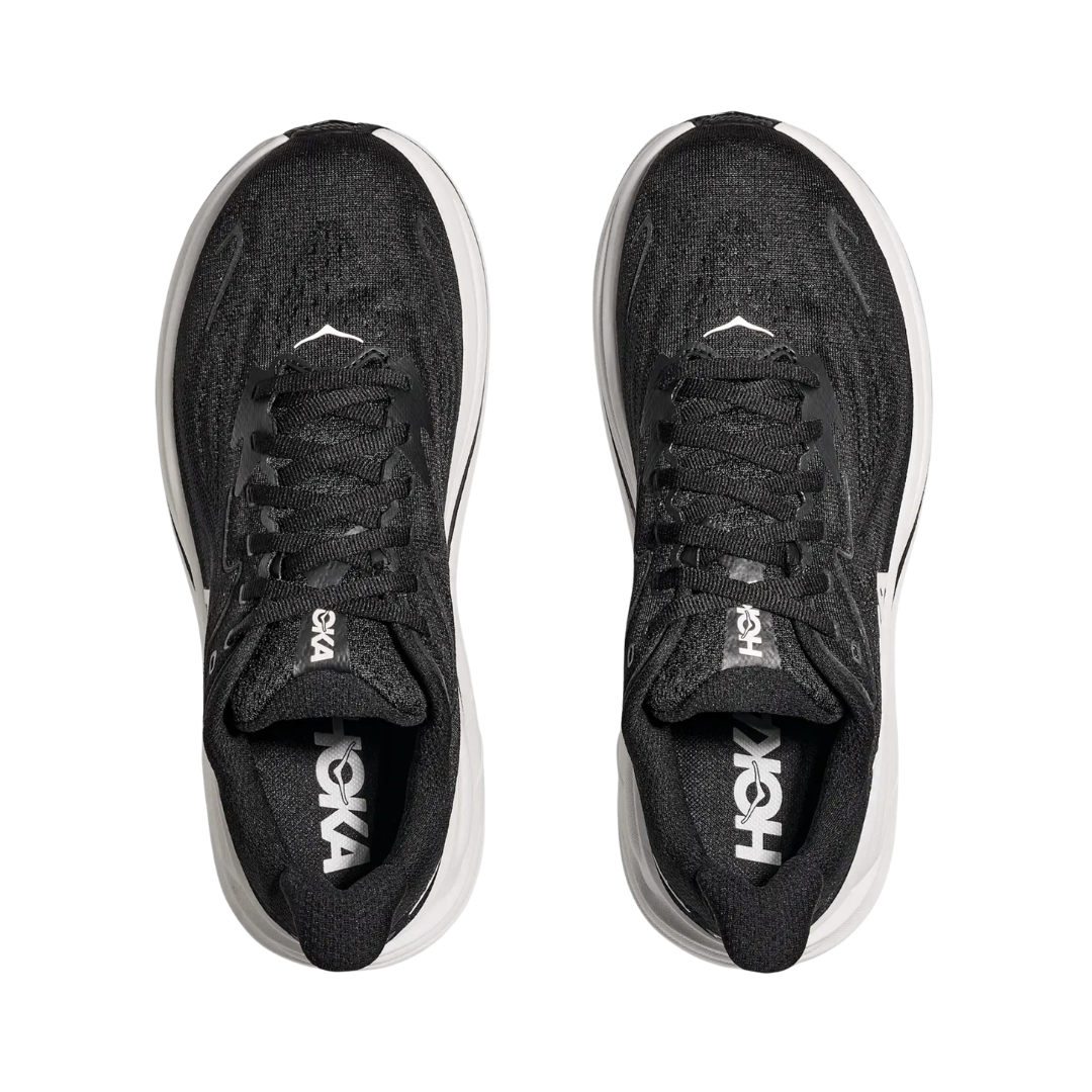 Top view of the HOKA Women’s Clifton 10 in Black/White, showing the molded EVA sockliner, padded tongue, and double-lace lock system for secure, cushioned all-day comfort.